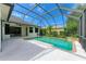Enclosed pool area with screen, and blue skies at 6423 Royal Tern Cir, Lakewood Ranch, FL 34202