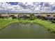 The property has stunning views of the pond and lush landscaping from above at 6507 Clairborne Ln, Bradenton, FL 34211