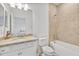 Bright bathroom features vanity with granite countertops, recessed lighting, and a shower-tub combination at 6507 Clairborne Ln, Bradenton, FL 34211