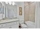 Clean bathroom boasts single vanity with granite countertops, framed art, and a shower-tub combination at 6507 Clairborne Ln, Bradenton, FL 34211