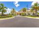Modern clubhouse featuring manicured landscaping, an inviting entrance and a convenient parking area at 6507 Clairborne Ln, Bradenton, FL 34211