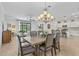 Open-concept floor plan connects dining room and kitchen, perfect for gatherings and entertaining at 6507 Clairborne Ln, Bradenton, FL 34211