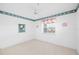 Neat bedroom with ceiling fan and ample natural light at 6507 Stone River Rd # 304, Bradenton, FL 34203