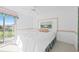 Bright bedroom with scenic views and access to a balcony at 6507 Stone River Rd # 304, Bradenton, FL 34203