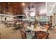 Clubhouse dining room with ample seating and golf course views at 6507 Stone River Rd # 304, Bradenton, FL 34203