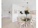 Cozy dining area with glass top table and seating for six at 6507 Stone River Rd # 304, Bradenton, FL 34203