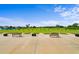 Well-maintained driving range with ample space for practice, set against a picturesque landscape at 6507 Stone River Rd # 304, Bradenton, FL 34203