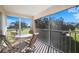 Relaxing screened lanai featuring comfortable seating, perfect for enjoying the outdoors at 6507 Stone River Rd # 304, Bradenton, FL 34203