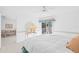 Comfortable main bedroom with balcony access and serene decor at 6507 Stone River Rd # 304, Bradenton, FL 34203