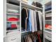 Organized walk-in closet with custom shelving for efficient storage at 6563 Silverstar Dr, Sarasota, FL 34240