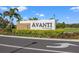 Elegant Avanti at Waterside community entrance sign amidst lush landscaping at 6563 Silverstar Dr, Sarasota, FL 34240