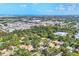 Beautiful aerial shot showcasing the property's location with water views and surrounding community at 6832 Woodwind Dr # 53, Sarasota, FL 34231