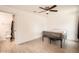 Bright bathroom featuring wood-look floors, a ceiling fan, and a toilet at 718 17Th E St, Bradenton, FL 34208
