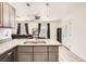 Bright kitchen with granite countertops and stainless steel sink at 718 17Th E St, Bradenton, FL 34208