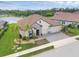 An aerial view of a beautiful single-Gathering home with a tile roof, three-car garage, and lake views at 7228 Great Egret Blvd, Sarasota, FL 34241