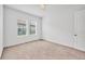 Neutral bedroom with carpet and white walls provides a serene and customizable living space at 7228 Great Egret Blvd, Sarasota, FL 34241