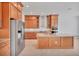 Modern kitchen with granite countertops, stainless steel appliances, and ample cabinet space at 7228 Great Egret Blvd, Sarasota, FL 34241
