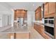 Bright and modern kitchen featuring granite countertops, stainless appliances, and ample counter space at 7228 Great Egret Blvd, Sarasota, FL 34241