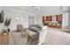 Inviting living room featuring modern furnishings and an open layout to the kitchen at 7228 Great Egret Blvd, Sarasota, FL 34241