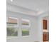 Living room with two windows at 7228 Great Egret Blvd, Sarasota, FL 34241