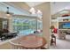 Cozy breakfast nook overlooking the screened lanai and pool area at 7464 Ridge Rd, Sarasota, FL 34238