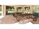 Outdoor picnic area with multiple tables and benches at 7464 Ridge Rd, Sarasota, FL 34238