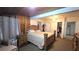 Bedroom with beautiful wood accents and plush bedding, a comfortable retreat for rest and relaxation at 809 30Th E Ave, Bradenton, FL 34208