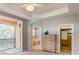 Spacious main bedroom with walk-in closet and balcony access at 8168 Villa Grande Ct, Sarasota, FL 34243