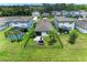 Aerial view of backyard featuring pool, fenced yard, and trampoline at 8721 Firefly Pl, Parrish, FL 34219