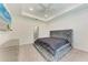 Luxurious primary bedroom suite featuring a plush tufted headboard at 8721 Firefly Pl, Parrish, FL 34219