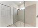 Walk-in shower features glass enclosure and tiled walls in this bathroom at 8721 Firefly Pl, Parrish, FL 34219