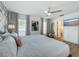 Bright bedroom with wallpapered accent wall at 912 Ponderosa Pine Ln, Sarasota, FL 34243