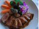 Delicious plated dinner featuring sliced steak, roasted potatoes, carrots, and broccoli at 912 Ponderosa Pine Ln, Sarasota, FL 34243