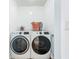 Laundry room with front loading washer and dryer at 912 Ponderosa Pine Ln, Sarasota, FL 34243