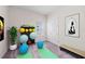 A versatile bedroom set up for yoga or exercise, ready for healthy lifestyle activities at 10309 Longmeadow Ave, Parrish, FL 34219