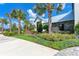Brightwood Pavilion community entrance sign with tropical landscaping and modern building architecture at 10309 Longmeadow Ave, Parrish, FL 34219