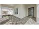 Welcoming front entrance features beautiful pavers and a stylish door, leading into this lovely home at 10309 Longmeadow Ave, Parrish, FL 34219