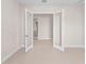 Spacious room featuring tile floors and glass french doors at 10309 Longmeadow Ave, Parrish, FL 34219