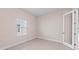 This well-lit room features tile floors and natural light at 10309 Longmeadow Ave, Parrish, FL 34219