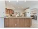 Modern kitchen with granite countertops, ample cabinetry, and stainless steel appliances at 11915 Oak Ridge Dr, Parrish, FL 34219