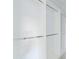 A simple walk-in closet with chrome racks, offering ample storage space at 13805 Posada St, Venice, FL 34293