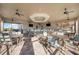 Stylish clubhouse with comfortable seating, TVs, and a bar area at 13805 Posada St, Venice, FL 34293