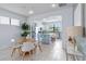 Bright kitchen with stainless steel appliances and a central island with bar seating at 13805 Posada St, Venice, FL 34293