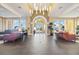 Spacious lobby area with a large reception desk, ample seating, and stylish decor, creating an inviting entry at 13805 Posada St, Venice, FL 34293
