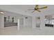 Open living area with tile floors, recessed lighting, and an open kitchen at 1400 62Nd S Pl, St Petersburg, FL 33705