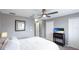 A bright bedroom with a ceiling fan and closet offering ample storage space at 1426 Harbour Blue St, Ruskin, FL 33570