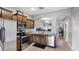 Bright and airy kitchen featuring stainless steel appliances and granite countertops at 1426 Harbour Blue St, Ruskin, FL 33570