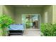 Inviting patio area overlooking a serene pond, perfect for outdoor relaxation and entertaining at 1426 Harbour Blue St, Ruskin, FL 33570