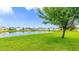 Beautiful pond view showcasing the community homes and serene landscape at 1426 Harbour Blue St, Ruskin, FL 33570