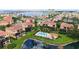 Stunning aerial view of waterfront residential community with a pool at 1512 3Rd Street E Cir, Palmetto, FL 34221